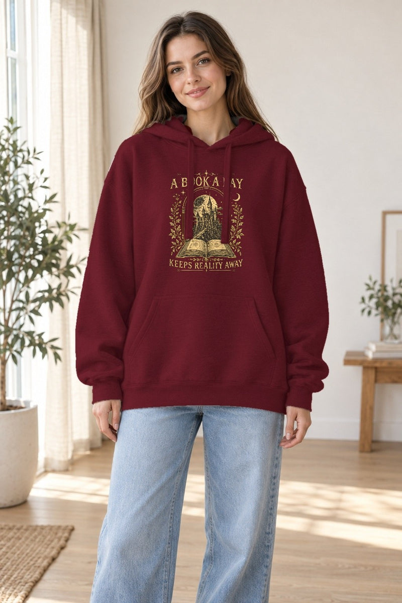 Buch-Shirt „A Book a Day Keeps Reality Away“