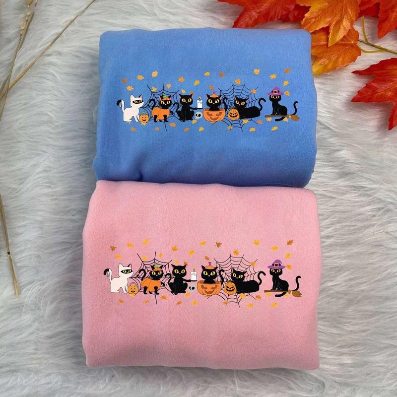 Halloween Pullover mit Katzen im Kostüm