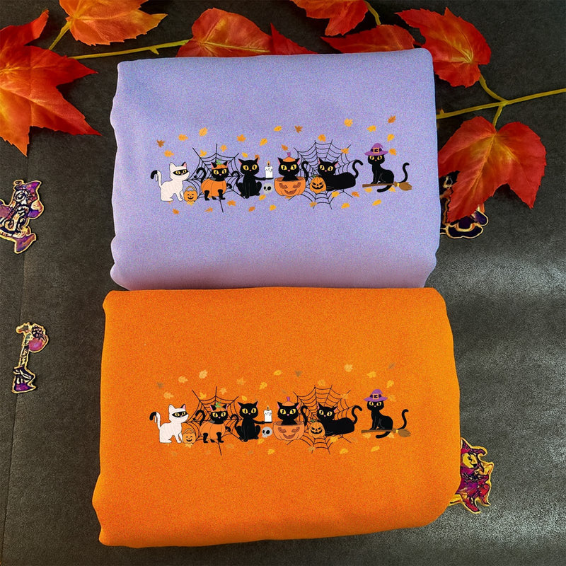 Halloween Pullover mit Katzen im Kostüm