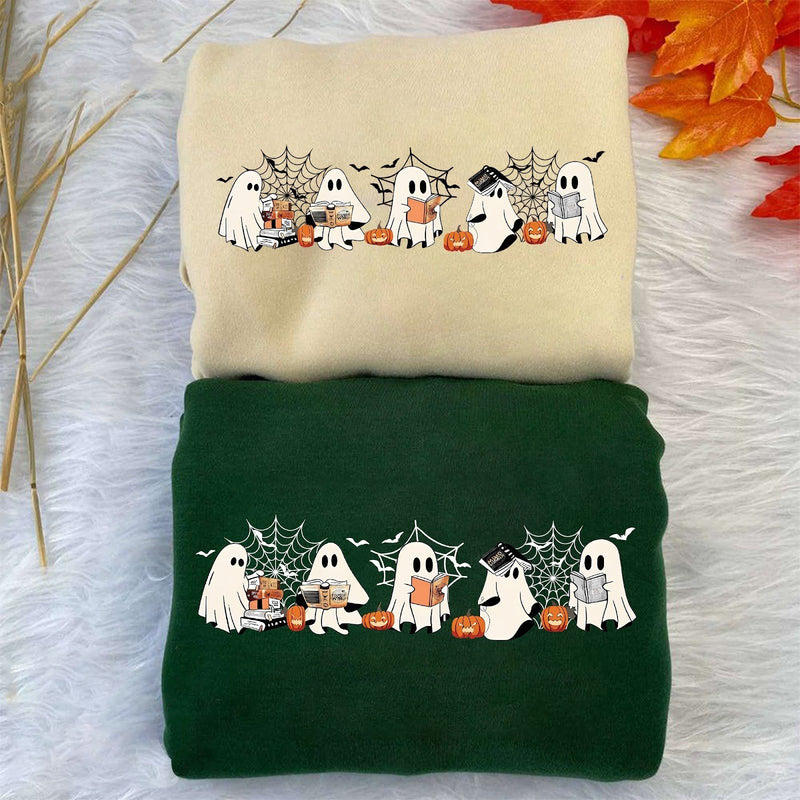 Halloween-Pullover mit Gespenstern, Büchern und Kaffee